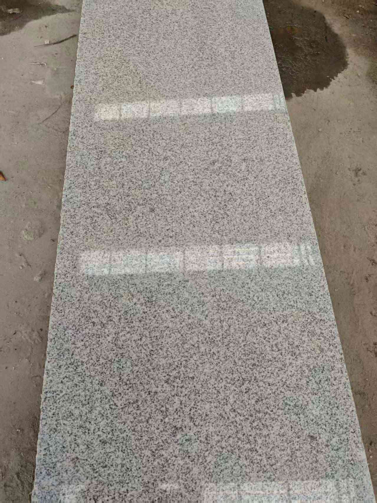 七台河芝麻白光面毛板